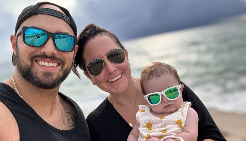 Parents with baby Andy at beach